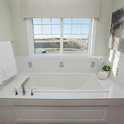 Ensuite tub - Landmark Homes’ front garage showhome