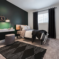 One of three secondary bedrooms – Pacesetter Homes’ front garage showhome